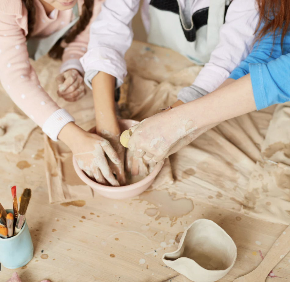 Children doing pottery