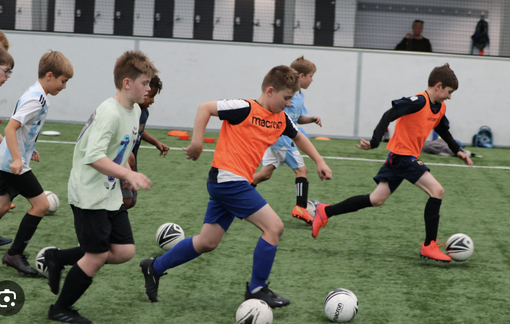 Kids playing football